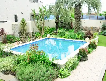 施工例　千葉県船橋市　新築庭工事　ハイクラス　タイルテラス　塀　門柱　アプローチ　天然石　植栽　天然芝　門扉